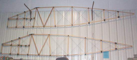 Two fuselage sides hanging on wall
