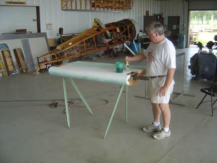 Bill Broussard works on the subwing