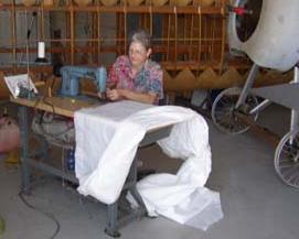 Clara Mae Marcotte sews wing covers