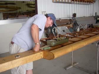 Tom Gaylord works on the middle wing