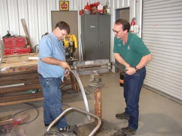 Rolling a lip into the cowling flange