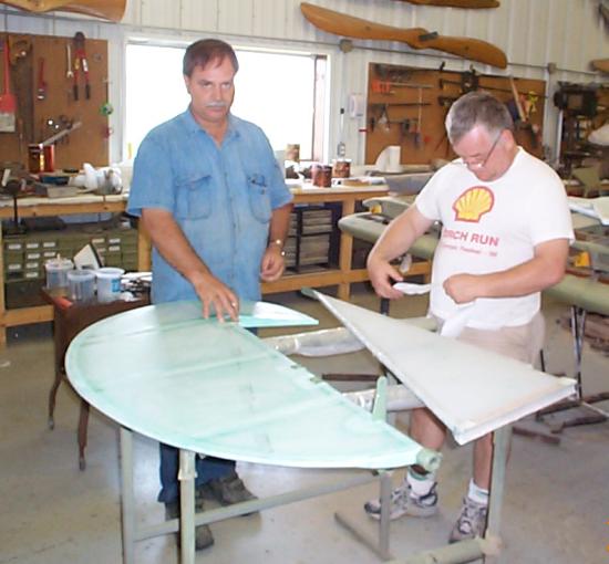 Roger Freeman and Bill Broussard covering the fin and rudder