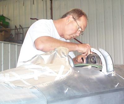 Ted Dawson working
on the fuel gauge fairing
