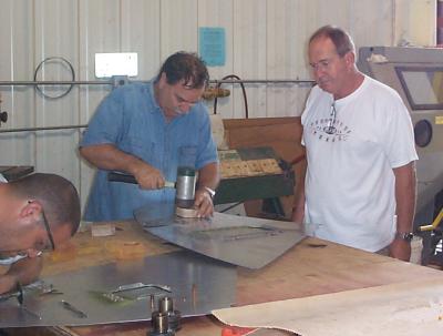 Forming louvers