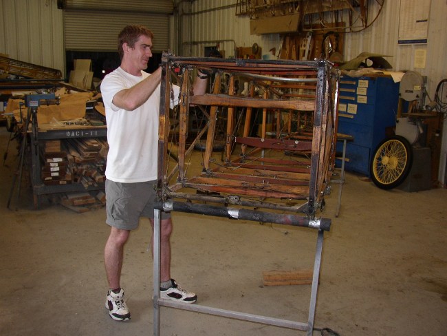 Jeff Basham cleans a Tommy fuselage