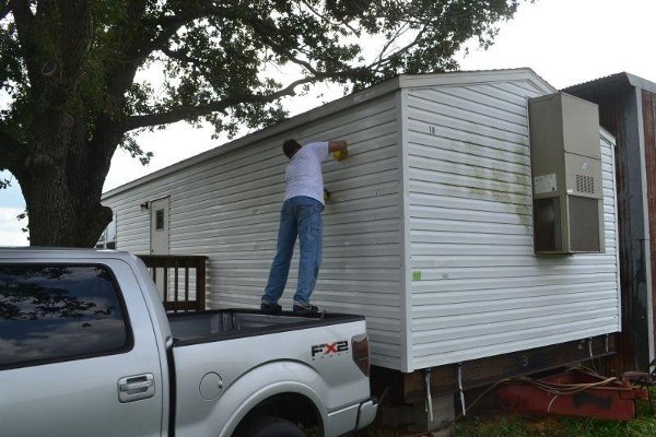 Tom Miller cleaning the museum headquarters